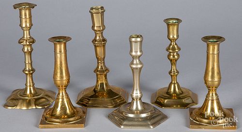 Five brass candlesticks, and a Paktong stick