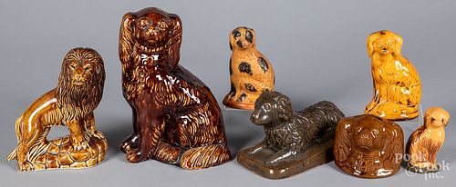 Seven pottery spaniels and banks