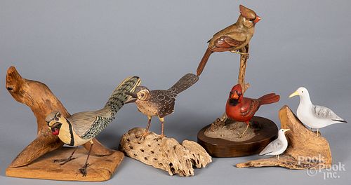 Four carved and painted bird groups