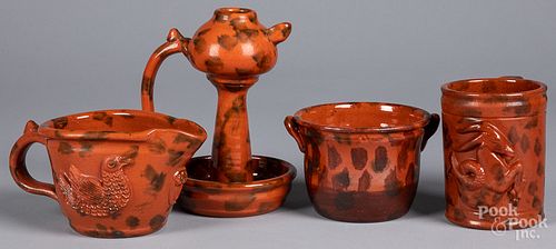 Four pieces of Seagreaves redware