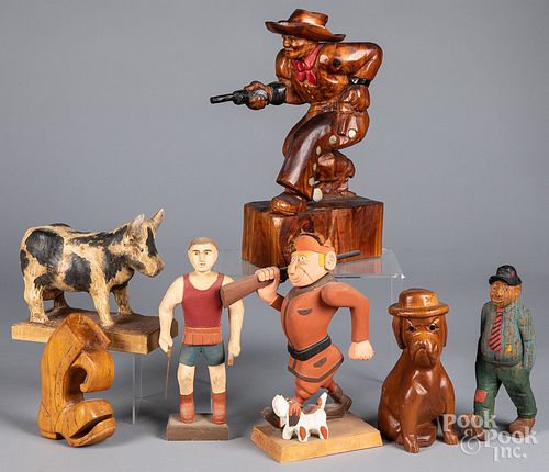 Seven carved and painted folk art figures