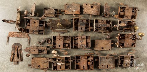 Collection of antique iron door locks.
