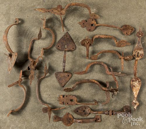 Collection of antique iron thumb latches.