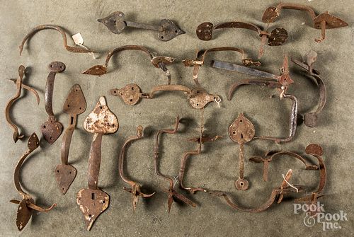 Collection of antique iron strap hinges.