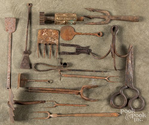Antique iron utensils and tools.