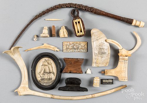Group of carved bone scrimshaw items