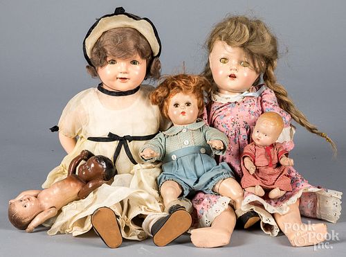 Five composition dolls