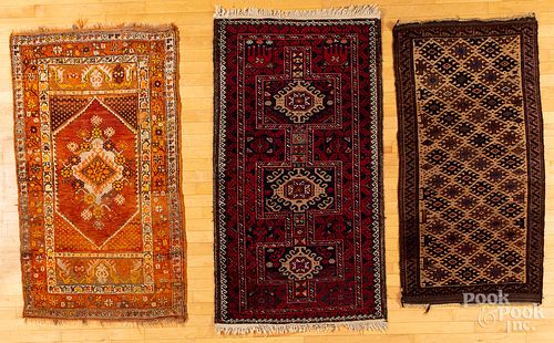 Three Oriental scatter rugs