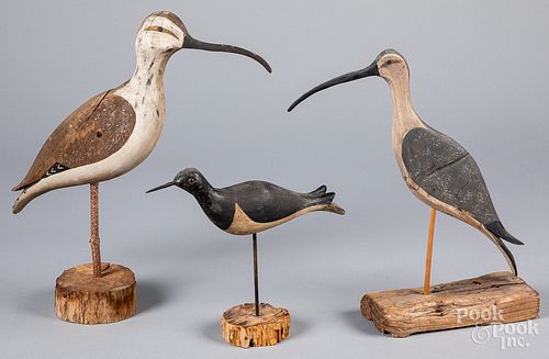 Three carved and painted shorebirds