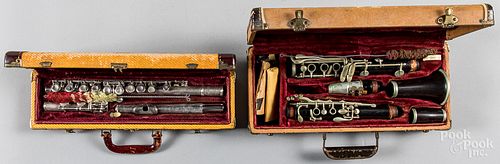 Cased Bundy flute, together with a German clarinet