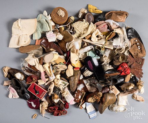 Large group of doll and children's shoes