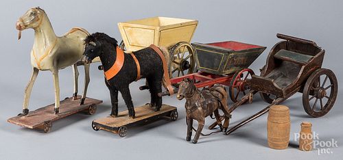 Three horse drawn carts