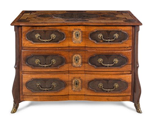 A Louis XIV Gilt Bronze Mounted Walnut and Oysterwood Commode