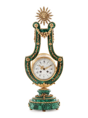 A Louis XIV Style Gilt Metal Mounted Malachite Veneered Harp Clock