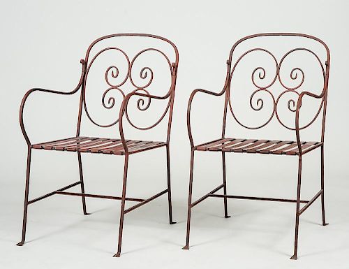 PAIR OF IRON GARDEN ARM CHAIRS