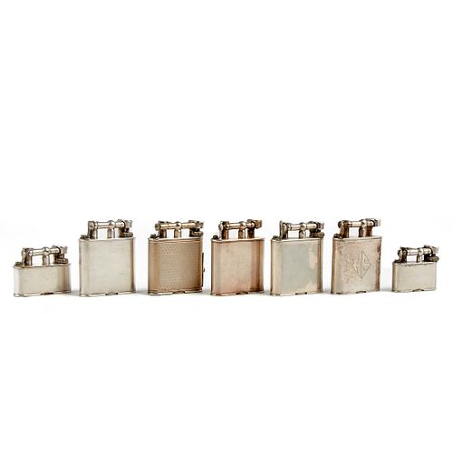 Grp: 7 Dunhill Unique Swing Arm Silver Plated Lighters