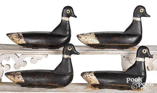 Rig of four carved and painted duck decoys