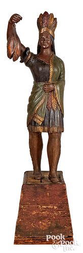 Carved and painted cigar store Indian maiden