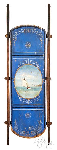 Painted sled, with sailboat