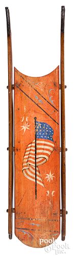Painted sled, decorated with the American flag