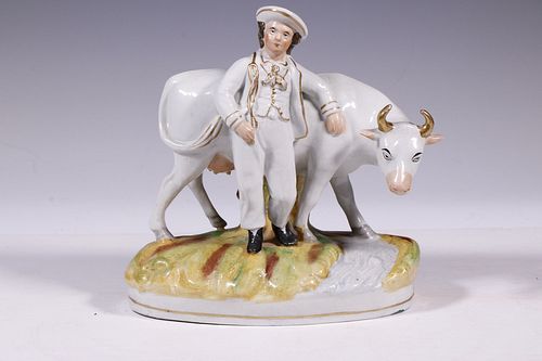 STAFFORDSHIRE BOY AND COW FIGURE
