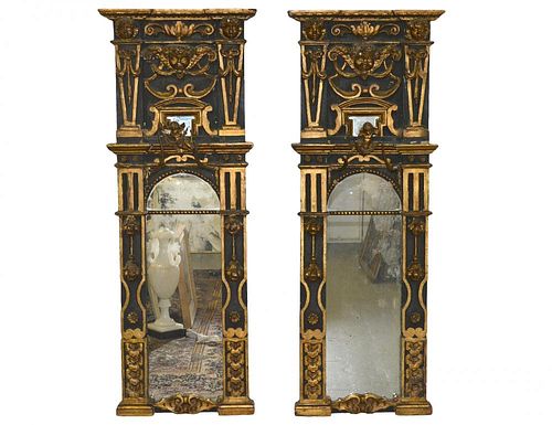 PAIR OF BAROQUE STYLE PARCEL GILT AND CARVED WOOD MIRRORS
