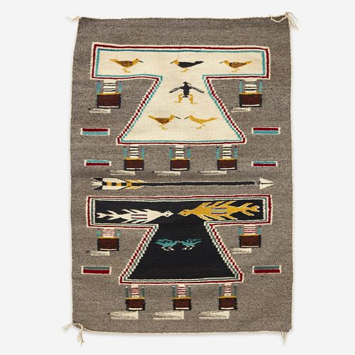 A Navajo Yei pictorial weaving first half 20th century
