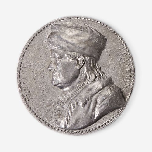 After Jean-Baptiste Nini (Italian, 1717-1786) A cast lead portrait medallion of Benjamin Franklin (1706-1790)