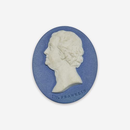 A Wedgwood & Bentley blue and white Jaspwerware portrait medallion of Benjamin Franklin (1706-1790) Designed by William Hackwood, Etruria, Staffordshi