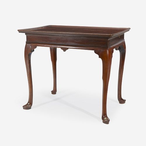 A Queen Anne carved mahogany tea table circa 1760