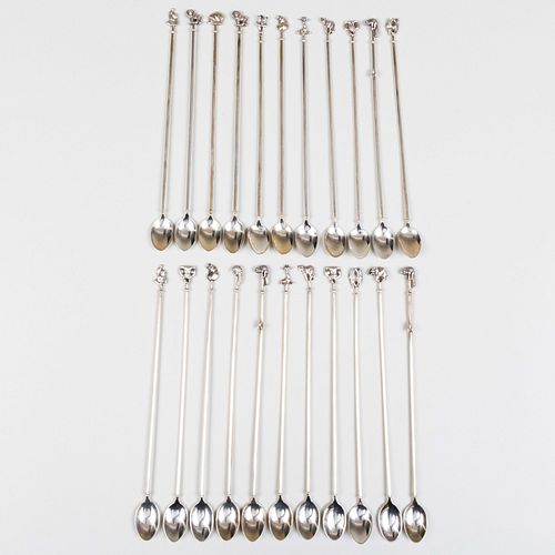 Set of Twenty-Two Southern Rhodesian Silver Iced Tea Spoons with African Plain Animal Finials