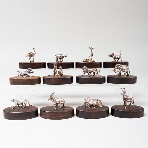 Set of Twelve South Rhodesian Silver Placecard Holders of African Plains Animals