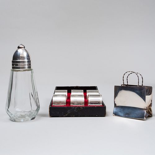 Cartier Silver Miniature Shopping Bag and a Christofle Silver Plate Syrup Jar