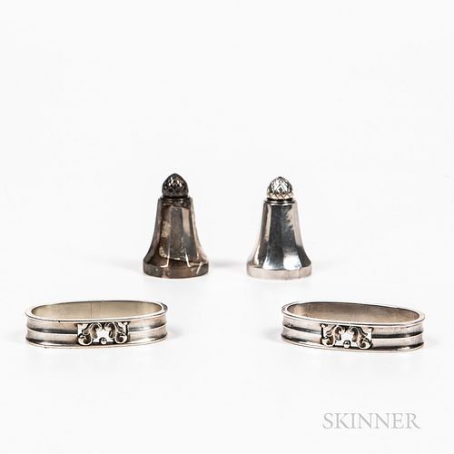 Two Georg Jensen Sterling Silver Salt Shakers and a Pair of Georg Jensen Sterling Silver Napkin Rings