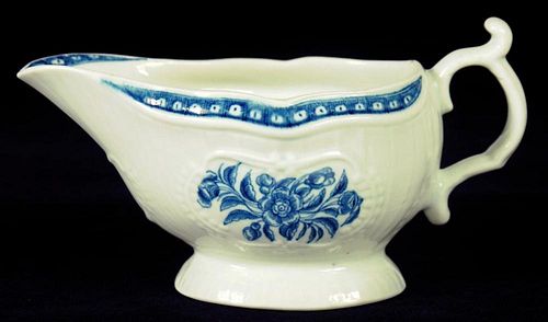 A WORCESTER STRAP FLUTED SAUCE BOAT, C1772-80  painted in underglaze blue with the Strap Flute Sauce