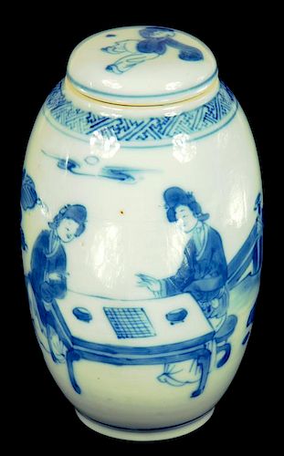 A CHINESE BLUE AND WHITE OVIFORM JAR AND COVER, KANGXI  painted with two ladies at a table playing a