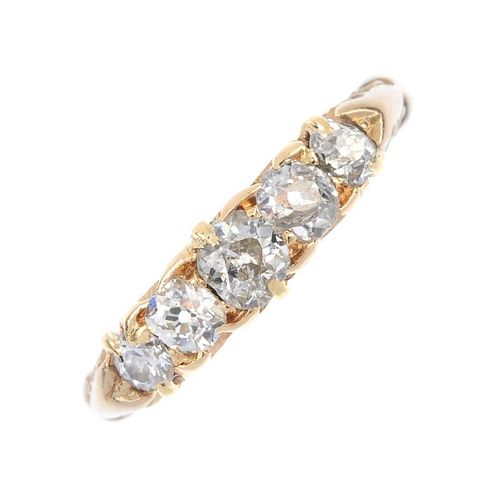 An Edwardian 18ct gold diamond five-stone ring. The graduated old and brilliant-cut diamond line, to