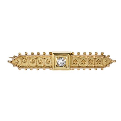 A late 19th century gold diamond brooch. The old-cut diamond, to the cannetille sides and bead edge.