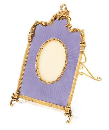 A RUSSIAN GILT SILVER AND GUILLOCHE ENAMEL FRAME, WORKMASTER MIKHAIL PERCHIN FOR FABERGE, ST. PETERSBURG, CIRCA 1890 