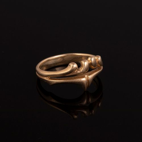 A Gold Wave Form Ring