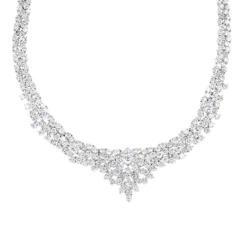 A diamond articulated collar. Comprising a series of five brilliant-cut diamonds, raised within the