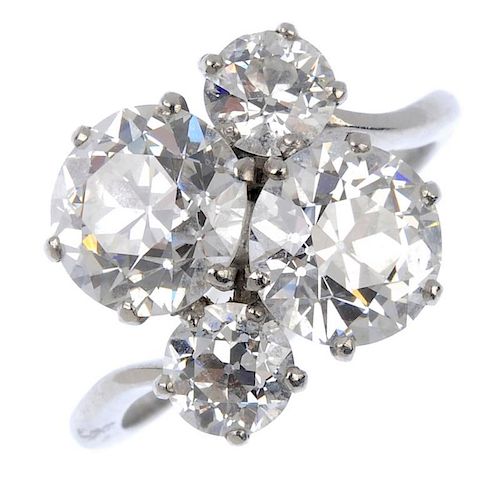 A diamond four-stone dress ring. The principal old-cut diamonds, weighing 2.31cts and 1.91cts respec