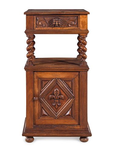 A William and Mary Style Carved Walnut Pedestal Table