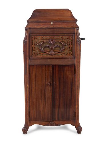 A Silvertone Carved and Stained Wood Tall Case Phonograph 