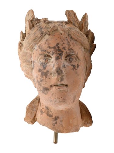 A Roman Style Terracotta Head of a Woman