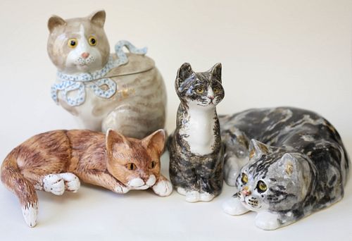 Four Porcelain Cats