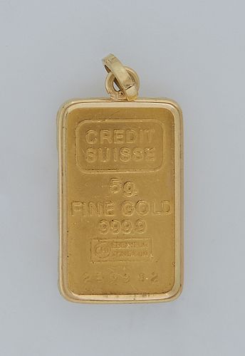 Credit Suisse 999.9 Yellow Gold Bar Five Gram Pendant, No. 259982, in a 14K yellow gold bezel, H.- 15/16 in., W.- 9/16 in. Provenance: The Estate of D