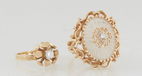 Two 14K Yellow Gold Lady's Dinner Rings, consisting of a floriform nugget ring with a 25 point center diamond and a grooved band, Size 6 1/2; and an o