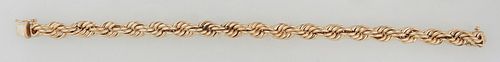 Tiffany & Co. 14K Yellow Gold Braided Rope Twist Bracelet, marked "Tiffany & Co., 585," L.- 7 3/4 in., Wt.- .6 Troy Oz. Note: This tests as 18K, but i