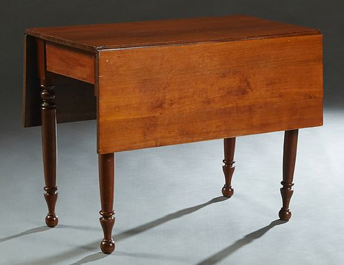 American Carved Mahogany Drop Leaf Dining Table, late 19th c. the rectangular top over a wide skirt, on turned tapered legs, H.- 29 1/8 in. W.- 38 7/8